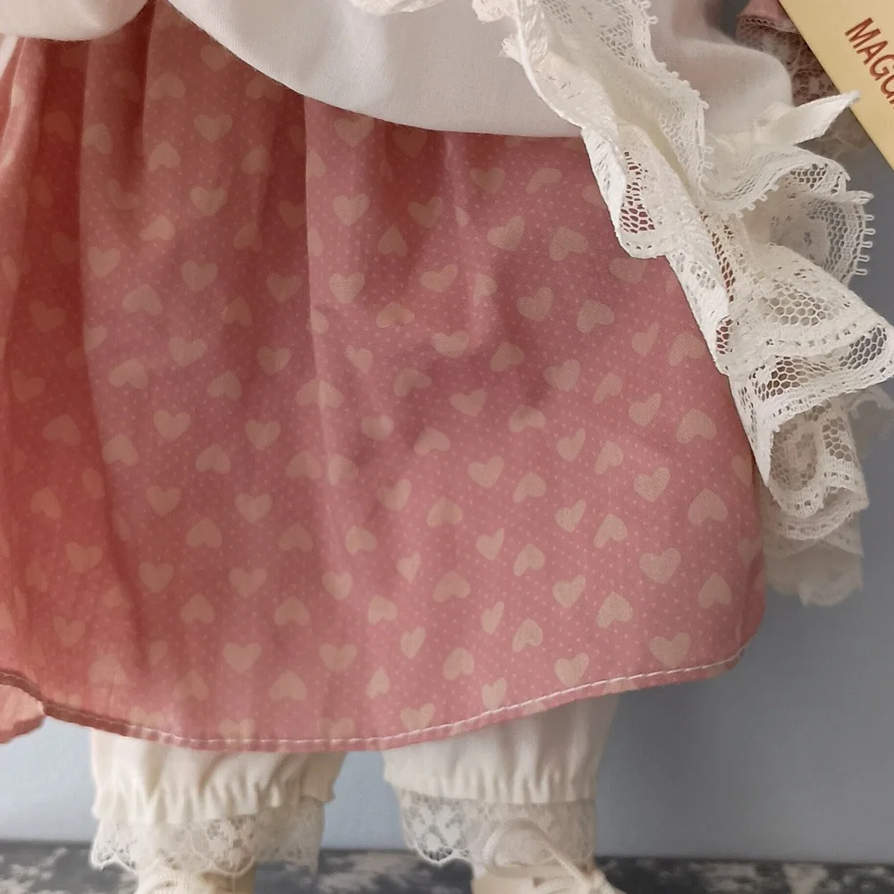 Vintage Porcelain Doll with Pink Dress and Bonnet by Dynasty Dolls